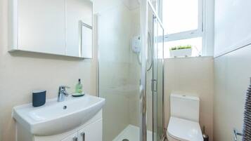 Hair dryer, towels, soap, toilet paper