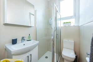 Hair dryer, towels, soap, toilet paper