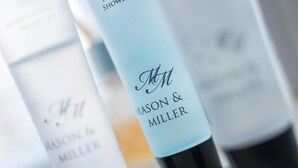 A close-up of Mason & Miller shower products. - The Westfield, comfortable 2 bedroom apartment that sleeps 4 (Edinburgh)