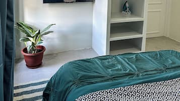 1 slaapkamer, een kluis op de kamer, een strijkplank/strijkijzer