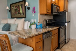 Coffee/tea maker, fridge, microwave, oven