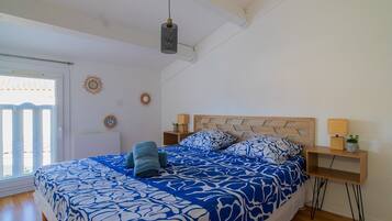 2 slaapkamers, een strijkplank/strijkijzer, reisbedje, gratis wifi