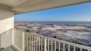 A balcony with a view of a beach and ocean. - New owner Beautiful Beach view,Indoor pool & Hot Tub (Gulf Shores)