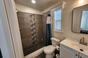 Shower, hair dryer, towels