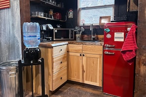 Fridge, microwave, stovetop, coffee/tea maker