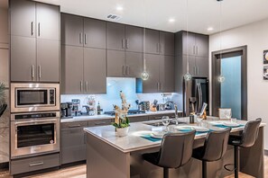 Fridge, microwave, oven, stovetop - Oak Lawn Luxury Stay  - Hot Tub & Arcade near Downtown Dallas (Dallas)