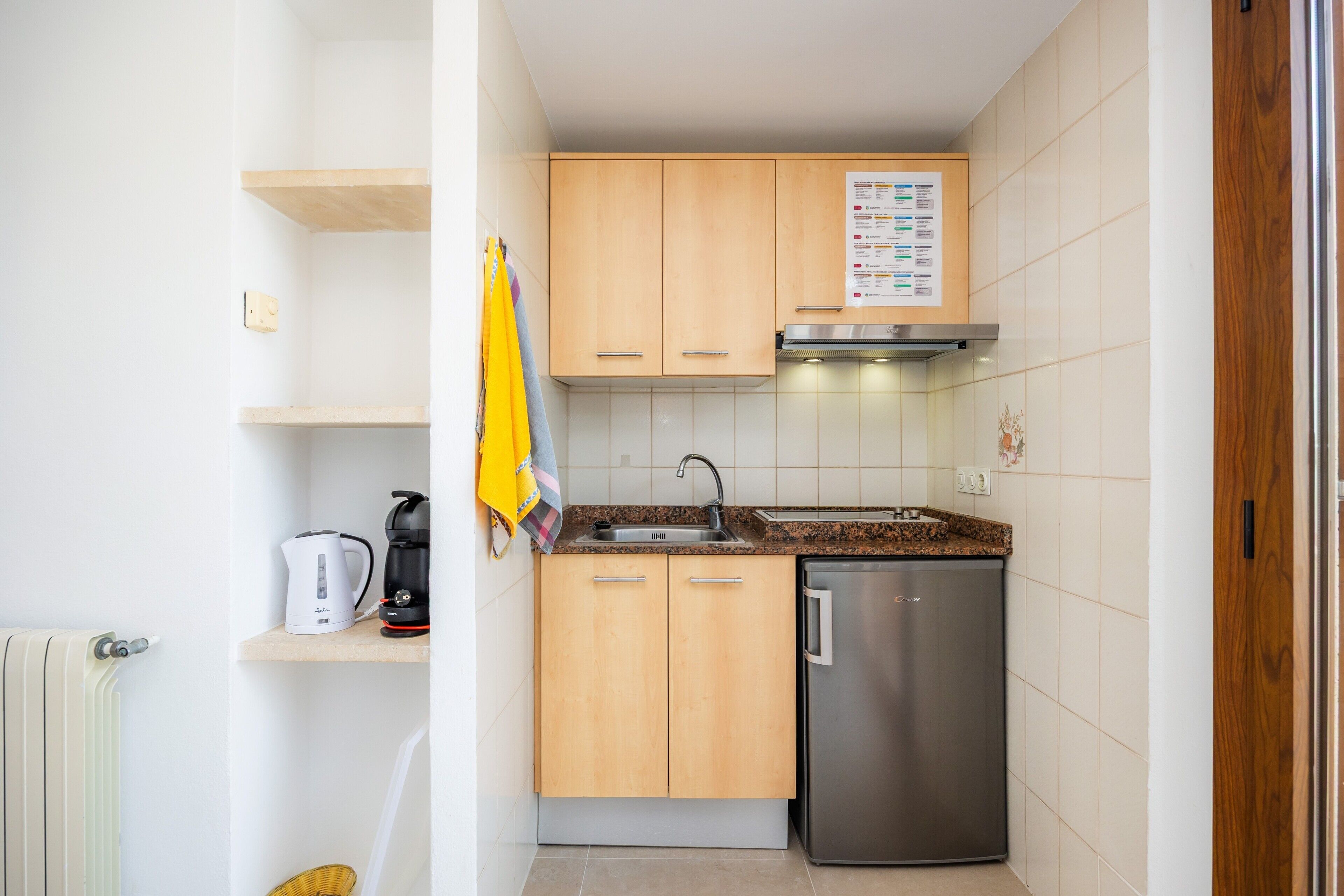 Fridge, microwave, stovetop, coffee/tea maker