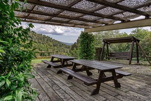 Outdoor dining - Holiday Home 'Can Soler De Merlant I' with Mountain Views, Shared Pool and Wi-Fi (Unknown)