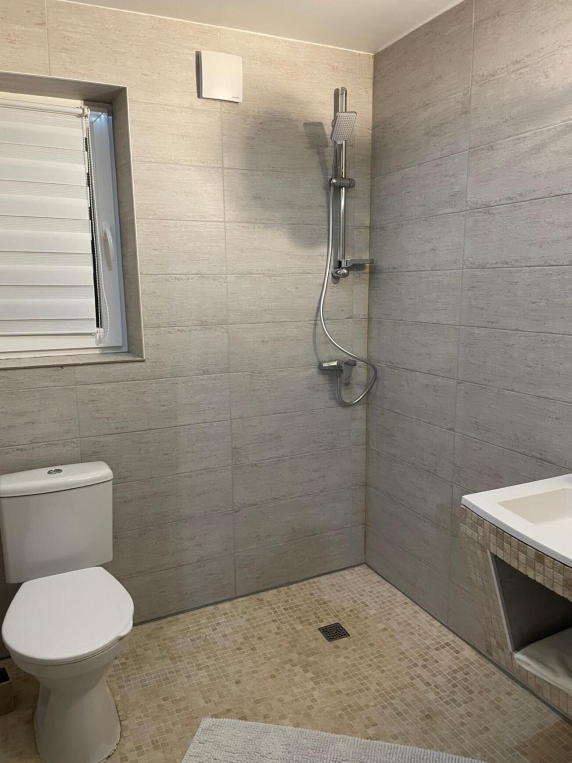 Een douche, handdoeken