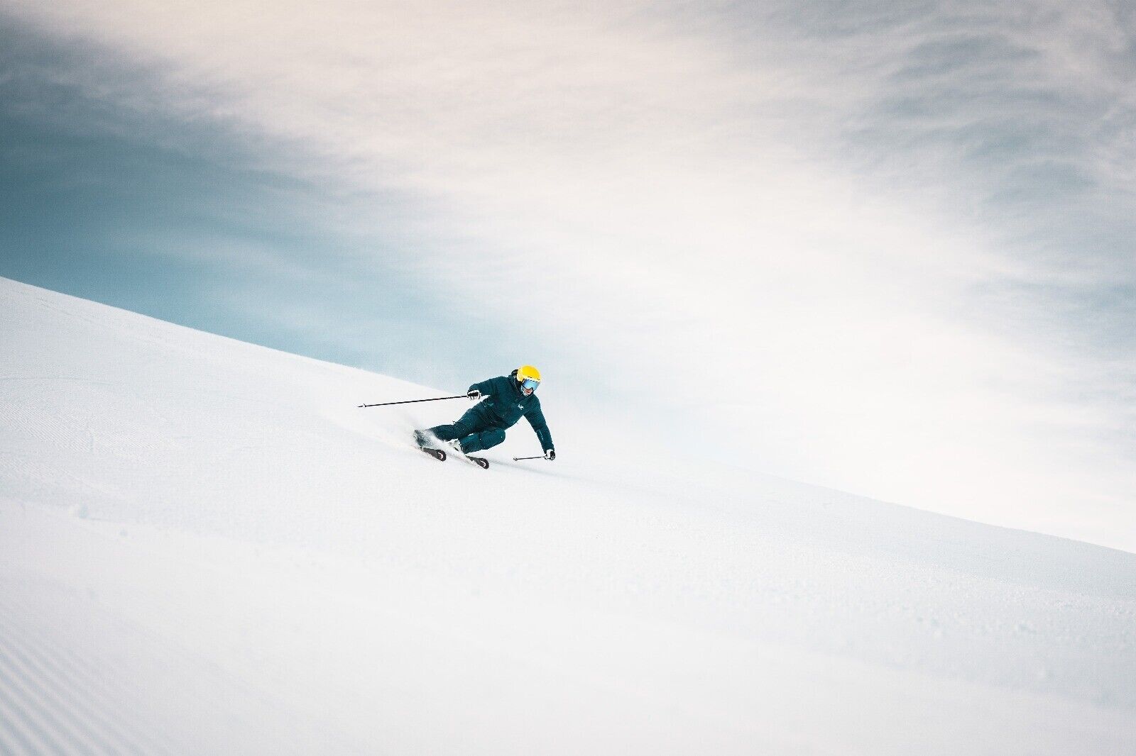 A skier on a snowy slope.
