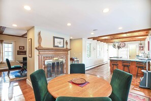 Sip morning coffee or grab a bite at the kitchen table, with seating for 4 - 4 BDR w/ Private Hot tub, Backyard and Deck! (Wells)