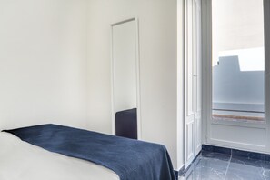 1 غرفة نوم ومكواة/لوح كي وواي فاي وملاءات أسرّة