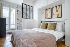 2 slaapkamers, een strijkplank/strijkijzer, wifi, beddengoed