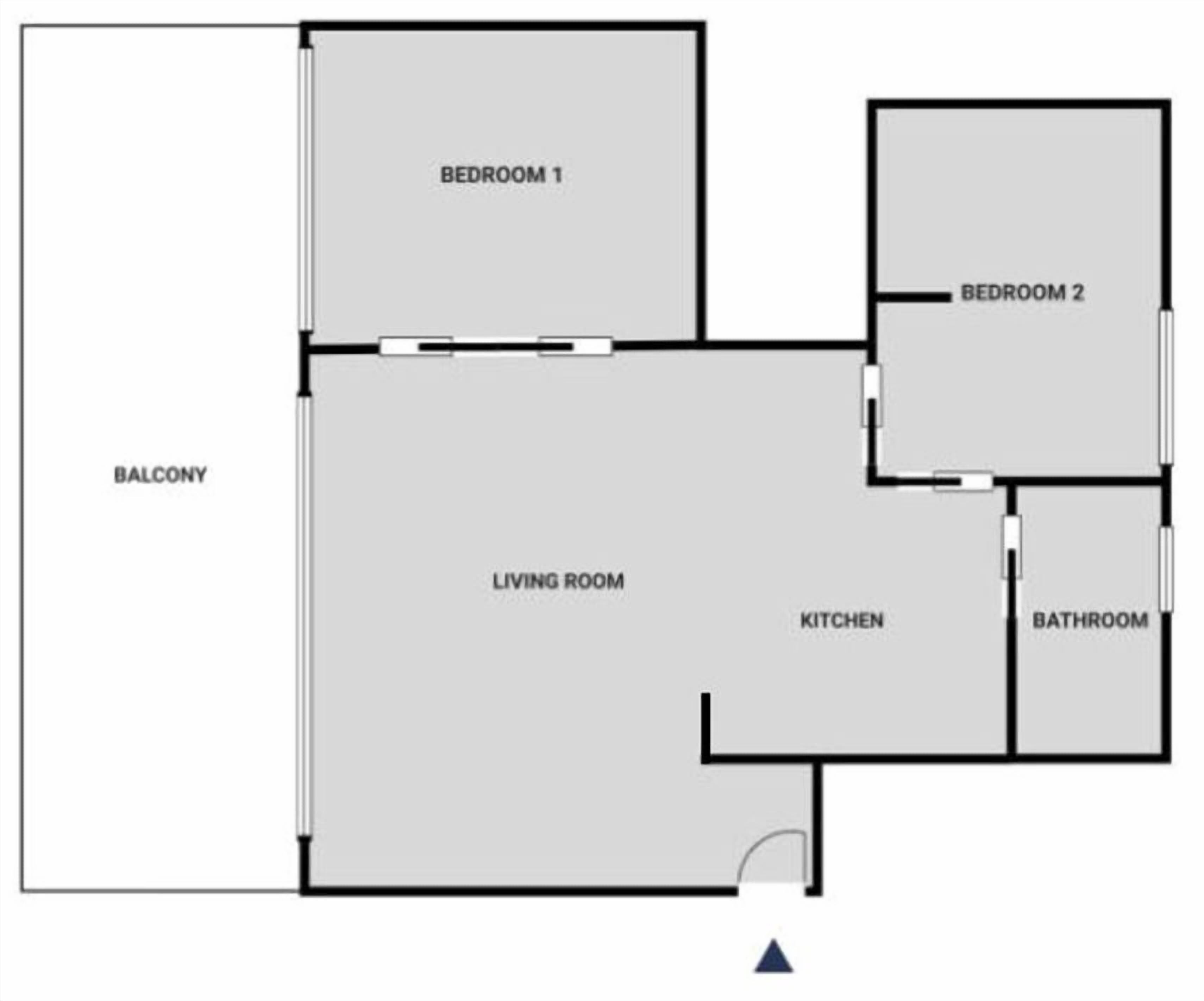 A floor plan with a living room, kitchen, two bedrooms, and a bathroom.