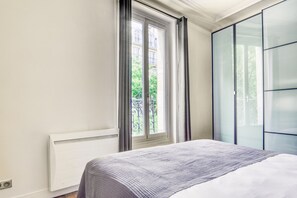 2 chambres, fer et planche à repasser, Wi-Fi, draps fournis