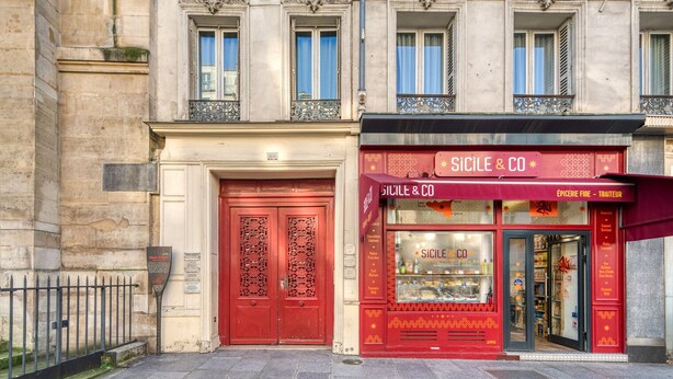 A building with a red door and a storefront labeled "SICILE & CO." - Blueground | St Paul, nr Bastille & Le Marais (Paris)