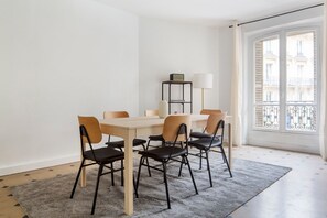 Enjoy meals in this dining area with a rectangular table and six comfortable chairs.