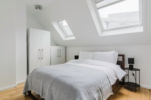 1 habitación, tabla de planchar con plancha, wifi y ropa de cama 