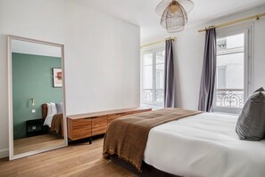 2 habitaciones, tabla de planchar con plancha, wifi y ropa de cama 