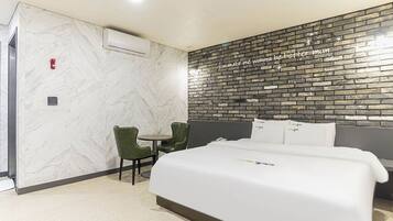 Deluxe Double Room + King Bed | Premium bedding, blackout drapes, soundproofing, free WiFi