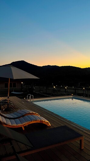 Seasonal outdoor pool, pool umbrellas, sun loungers