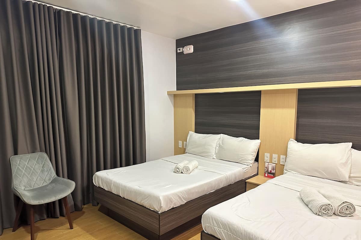 Deluxe Quadruple Room, City View