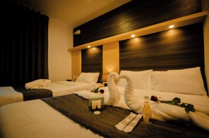 Deluxe Triple Room, City View | Living area - Rudhil's Place Hotel (Cebu City)