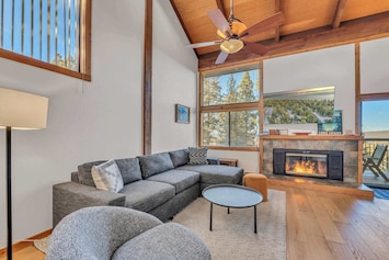 Living room: Smart TV, gas fireplace, central heating without A/C, third floor