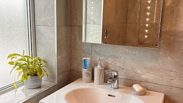 Hair dryer, towels, soap, shampoo