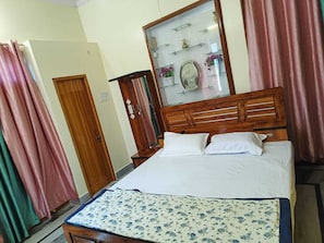Memory foam beds, in-room safe, desk, laptop workspace - Arya Holiday Home (Faizabad)