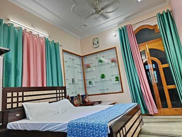 Memory foam beds, in-room safe, desk, laptop workspace - Arya Holiday Home (Faizabad)