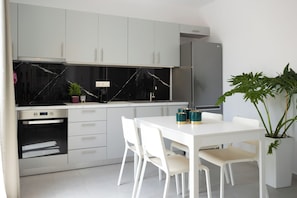 Suite Deluxe, vue sur la mer | Cuisine privée