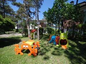 Children’s area - Spacious holiday apartment surrounded by greenery (Lignano Sabbiadoro)
