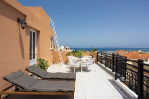 Deluxe suite, uitzicht op zee | Terras