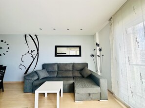 TV - Family Apartment with Garden, Pool, and AC near La Rubina Beach (Roses)