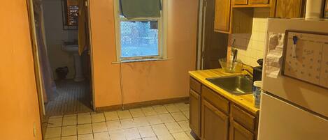 Fridge, microwave, stovetop, cookware/dishes/utensils