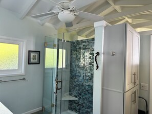 Shower, hair dryer, towels, soap