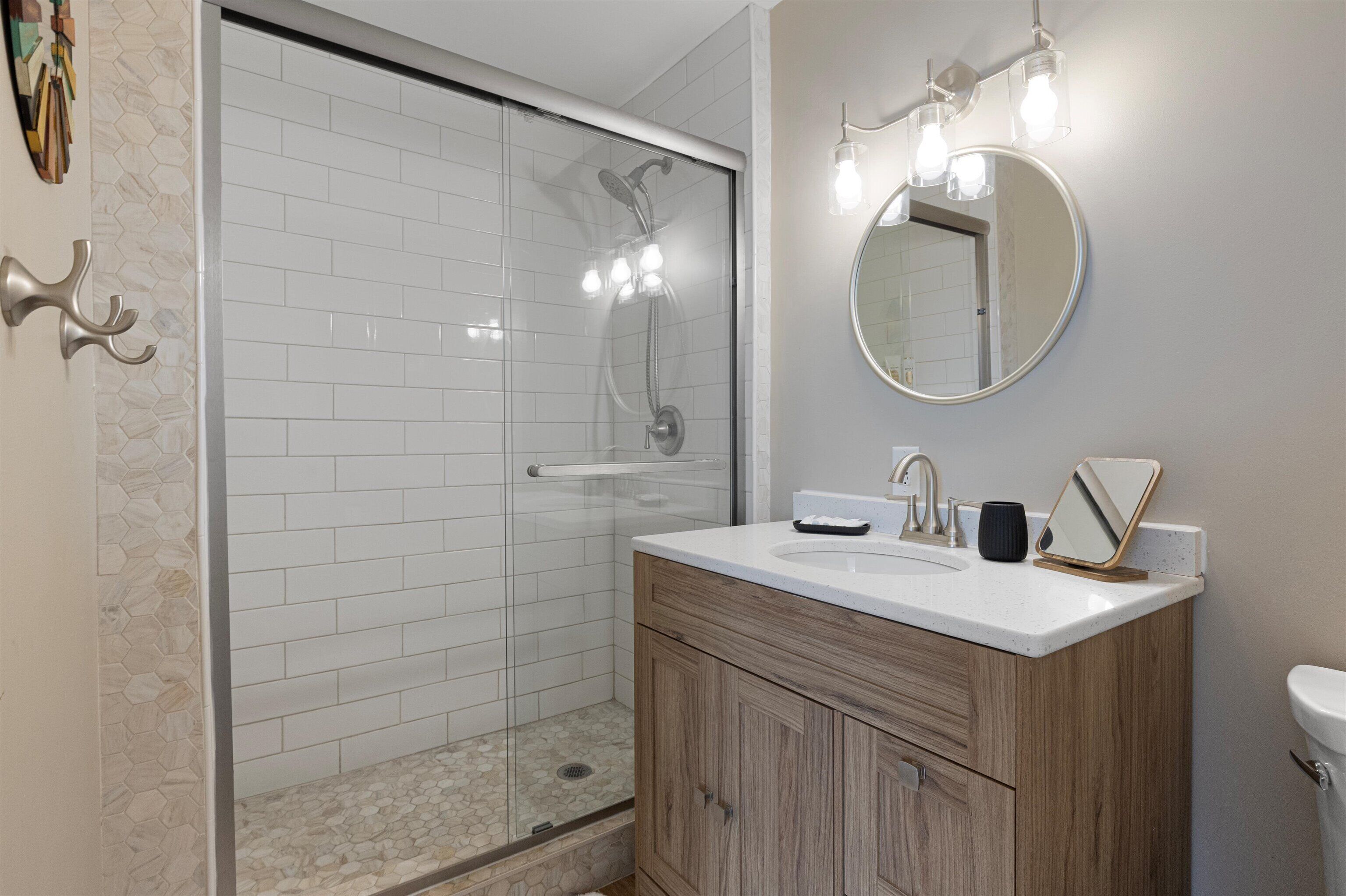 Shower, hair dryer, towels, soap
