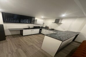 Fridge, microwave, stovetop, cookware/dishes/utensils