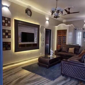 Luxury Apartment | Living area | Flat-screen TV - lg signature stays (Bangalore)