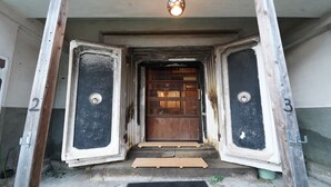 A doorway with a wooden door, numbered 2 and 3 on either side, leading to an interior space. - FR1 Kominka hotel Fukunokura (Nishiaizu-machi)