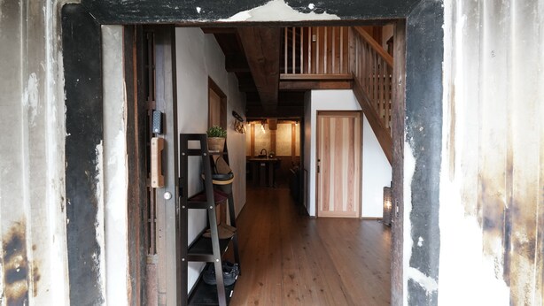 A narrow hallway with wooden flooring and a staircase leading to a loft area. - FR1 Kominka hotel Fukunokura (Nishiaizu-machi)