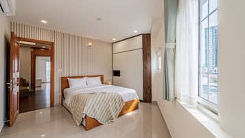 Luxury Apartment, City View | 3 bedrooms, in-room safe, desk, laptop workspace