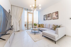 TV - Glimpse of Burj Khalifa 1BR, District 1 Phase 3 Residences 12, MBR City (Dubai)