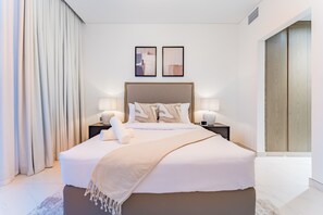 1 chambre, coffres-forts dans les chambres, fer et planche à repasser