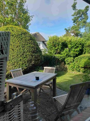 Relax in a tranquil outdoor space with a patio, perfect for casual dining or leisure activities.
