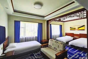 A hotel room with two beds, a sofa, a desk, and a TV. - Taiyuan Water Conservancy Building Finance University North Campus Store (Taiyuan)