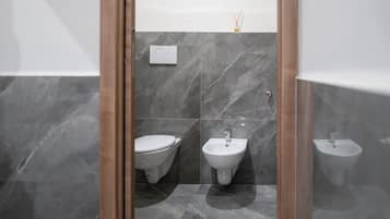 Deluxe kamer, uitzicht op tuin | Verduisterende gordijnen, geluiddichte muren, gratis wifi