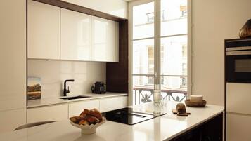 Apartamento | Cozinha privada | Cadeirão de bebê