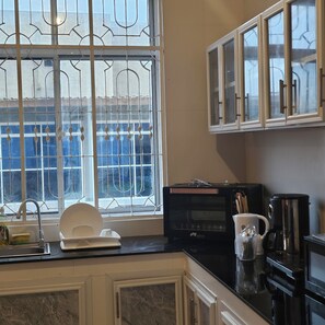 Fridge, microwave, oven, coffee/tea maker